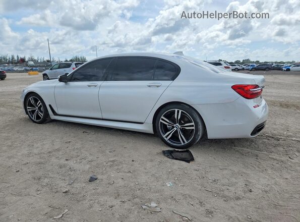 WBA7E2C58GG547860 2016 BMW 7 SERIES White Trasero derecho