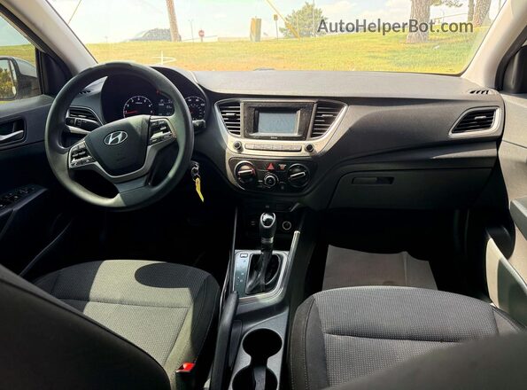 3KPC24A3XKE045092 2019 HYUNDAI ACCENT Silver Rear seats view