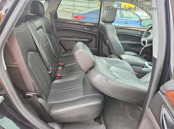 3GYFNEE36GS562588 2016 CADILLAC SRX Black Սալոնի հետևի տեսք