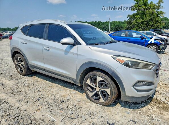 KM8J3CA25HU311078 2017 HYUNDAI TUCSON Silver Front view