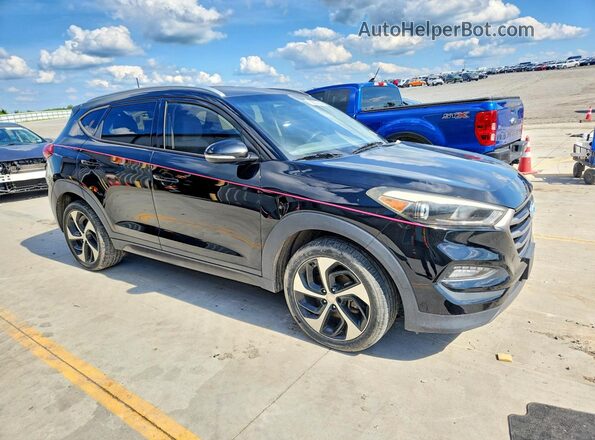 KM8J33A25GU044734 2016 HYUNDAI TUCSON Black Вид спереду