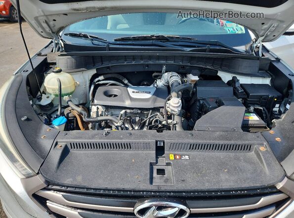 KM8J3CA20GU170581 2016 HYUNDAI TUCSON Silver VIN კოდის სტიკერის ხედი