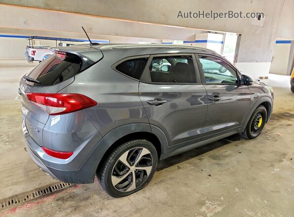 KM8J33A22GU183395 2016 HYUNDAI TUCSON Gray Front right