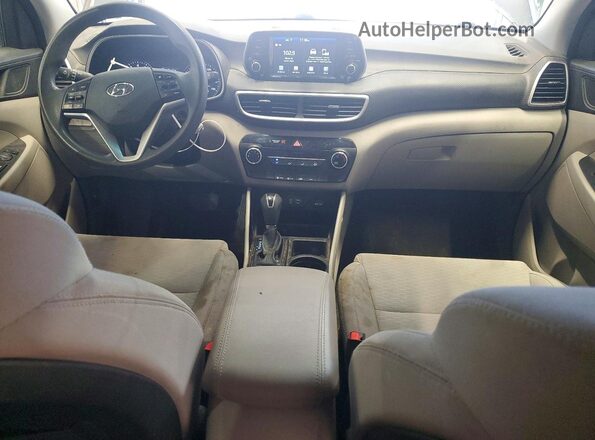 KM8J2CA4XKU956904 2019 HYUNDAI TUCSON Серый Вид панели приборов