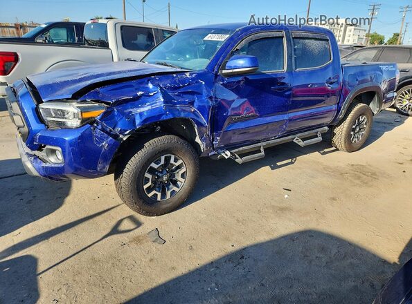 3TMAZ5CN2PM200187 2023 TOYOTA TACOMA Blue Trasero izquierdo