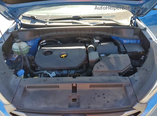 KM8J33A44GU091674 2016 HYUNDAI TUCSON Blue Vista de la etiqueta del VIN