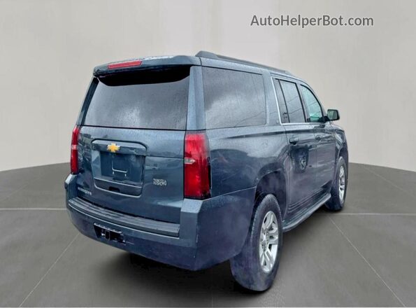 1GNSKHKC5KR222533 2019 CHEVROLET SUBURBAN Серый Вид спереди