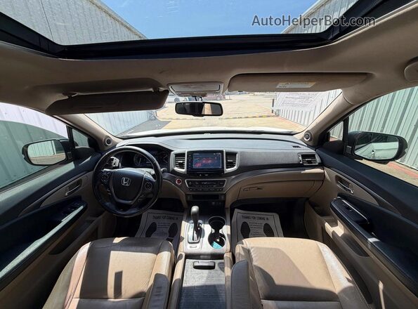 5FNYF5H57GB007571 2016 HONDA PILOT White Vista de los asientos traseros
