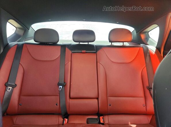 3KPFW4DE9SE191059 2025 KIA K4 Black Սալոնի հետևի տեսք