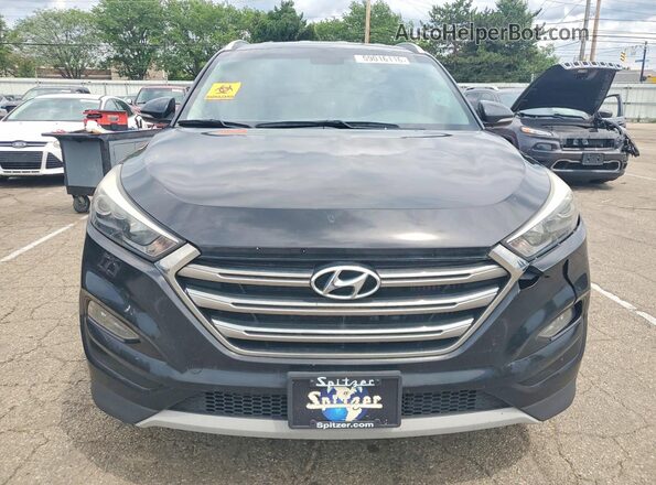 KM8J3CA26HU294873 2017 HYUNDAI TUCSON Черный Вид сзади