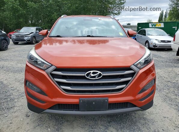 KM8J3CA21GU077326 2016 HYUNDAI TUCSON Оранжевый Вид сзади