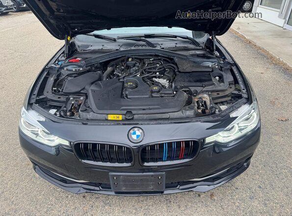 WBA8E1C55JA755929 2018 BMW 3 SERIES Черный Вид салона спереди