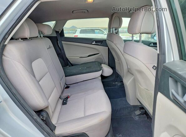 KM8J3CA40HU313774 2017 HYUNDAI TUCSON Silver Սալոնի հետևի տեսք