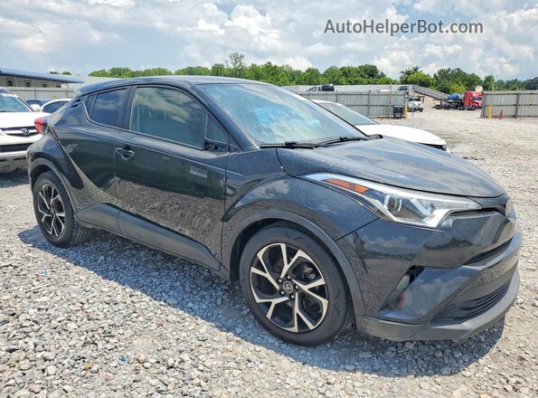 JTNKHMBX3K1058843 2019 TOYOTA C-HR Black Front view
