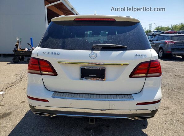 4JGDA5HB9GA757044 2016 MERCEDES-BENZ GLE-CLASS White წინა სალონის ხედი