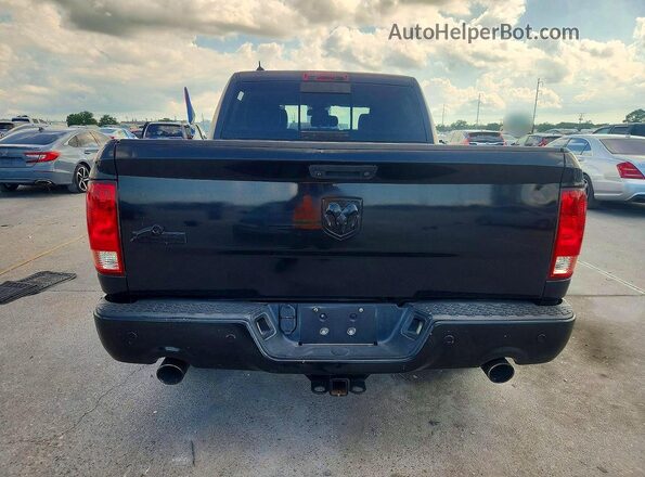 1C6RR6LT9JS275286 2018 RAM 1500 Черный Вид салона спереди