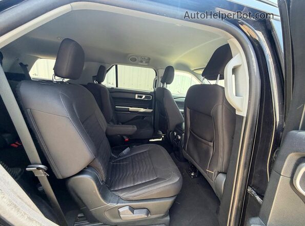 1FMSK7DH0MGB34446 2021 FORD EXPLORER Black Vista interior delantera