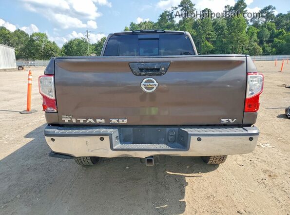 1N6BA1F24GN500967 2016 NISSAN TITAN Коричневый Вид салона спереди