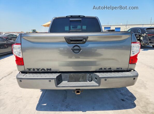 1N6AA1E51KN528726 2019 NISSAN TITAN Gray Вид салону спереду
