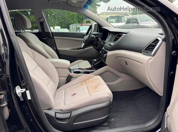KM8J3CA29GU145985 2016 HYUNDAI TUCSON Black Հետևի նստատեղերի տեսք