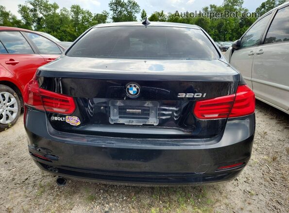WBA8E1G58HNU13050 2017 BMW 3 SERIES Black Widok wnętrza z przodu