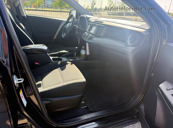 2T3ZFREV7JW467427 2018 TOYOTA RAV4 Black Vista trasera