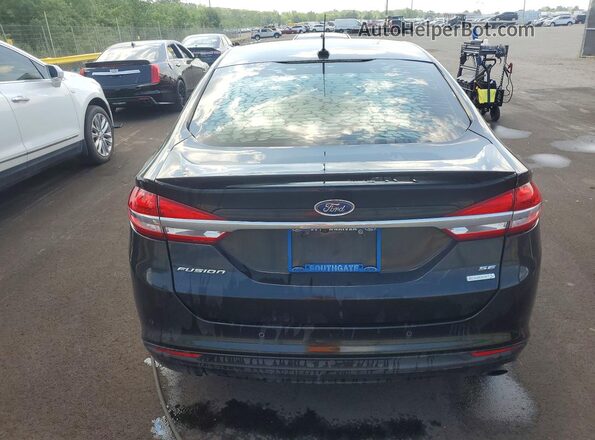 3FA6P0HD2HR270586 2017 FORD FUSION Black Vista interior delantera