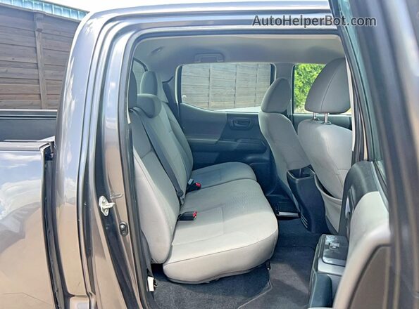 5TFAX5GN7JX104508 2018 TOYOTA TACOMA Gray Front interior view