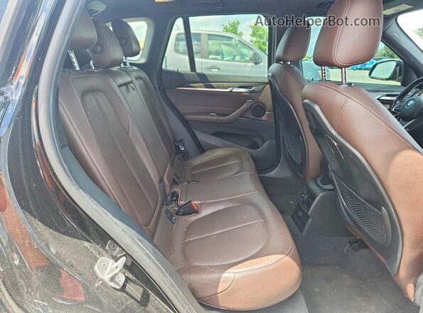 WBXHT3Z37H4A53653 2017 BMW X1 Black Вид підкапотного простору