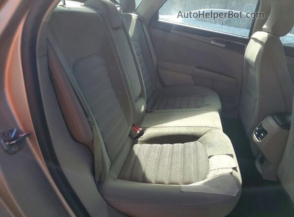 3FA6P0HD6JR185806 2018 FORD FUSION Gold Widok wnętrza z tyłu