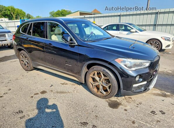 WBXHT3C33G5E47698 2016 BMW X1 Black Դիմացի տեսք
