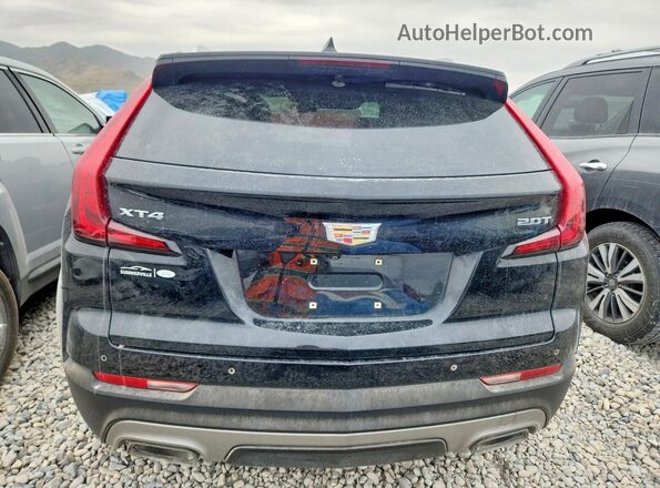 1GYFZCR40KF229683 2019 CADILLAC XT4 Черный Вид салона спереди
