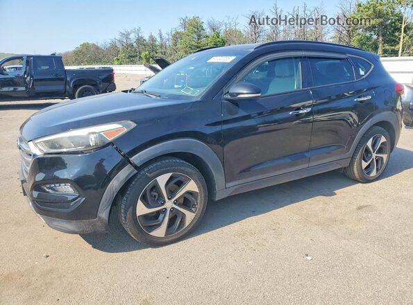 KM8J3CA27GU134256 2016 HYUNDAI TUCSON Black Trasero izquierdo