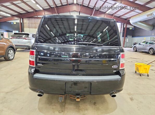 2FMHK6C83GBA09507 2016 FORD FLEX Black Front interior view