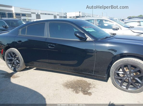 2C3CDXBG3NH129880 2022 DODGE CHARGER Black Սալոնի հետևի տեսք