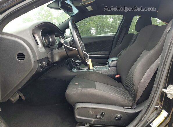 2C3CDXHG6PH571885 2023 DODGE CHARGER Черный Вид салона спереди