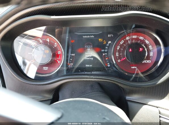 2C3CDZC93PH647910 2023 DODGE CHALLENGER Purple Vista de los asientos traseros