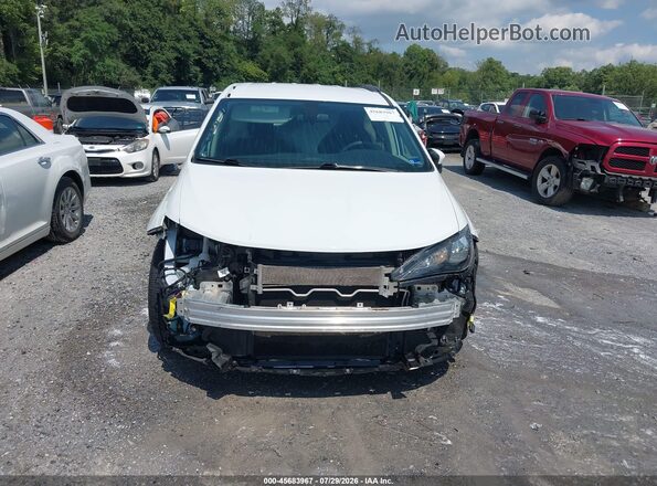 2C4RC1AG2LR146247 2020 CHRYSLER VOYAGER White Widok wnętrza z tyłu