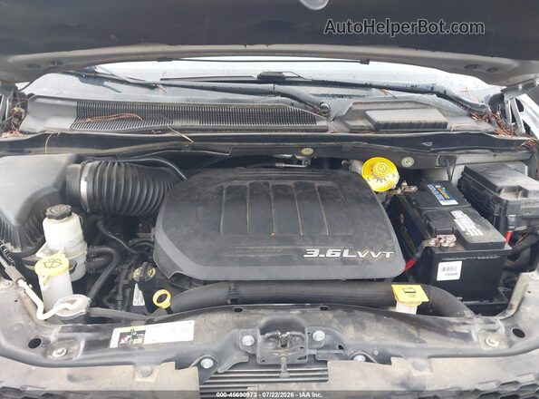 2C4RDGCG0GR379157 2016 DODGE GRAND CARAVAN Silver Vista trasera