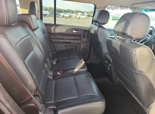 2FMGK5B8XGBA23055 2016 FORD FLEX Black Vista interior trasera