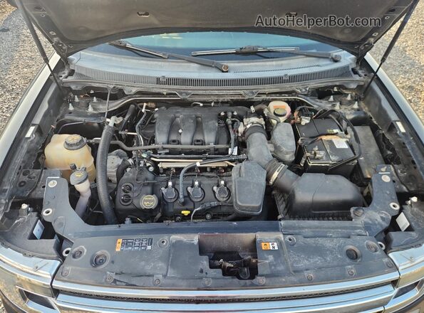 2FMGK5B8XGBA23055 2016 FORD FLEX Black Vista del compartimento del motor
