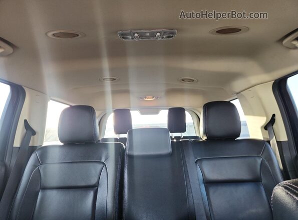 2FMGK5B8XGBA23055 2016 FORD FLEX Black Vista de los asientos traseros