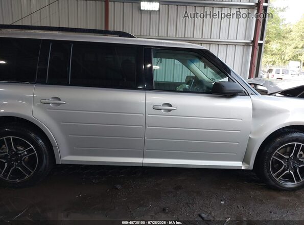 2FMGK5B8XHBA07682 2017 FORD FLEX Silver Вид задньої частини салону