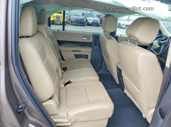 2FMGK5C82KBA32243 2019 FORD FLEX Brown Widok wnętrza z tyłu