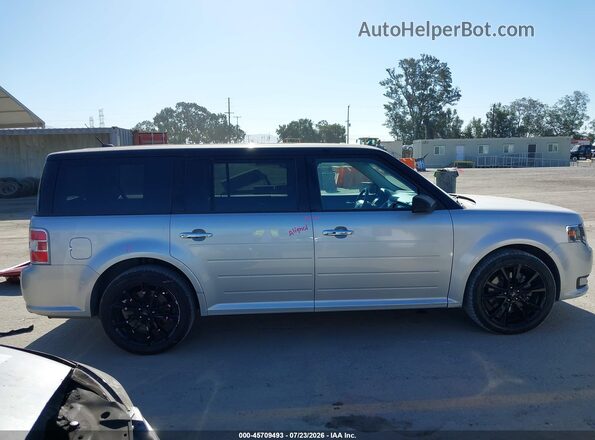2FMGK5C8XKBA13262 2019 FORD FLEX Silver Вид задньої частини салону
