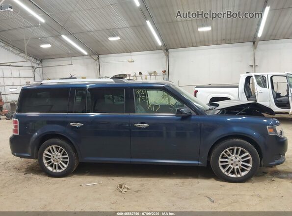 2FMHK6C83HBA10285 2017 FORD FLEX Синий Вид задней части салона
