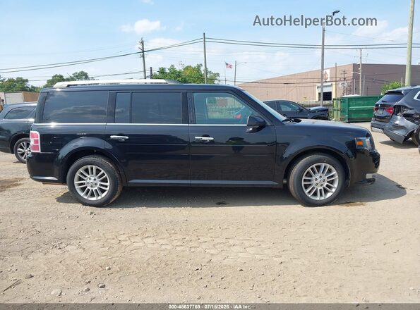 2FMHK6C8XKBA34199 2019 FORD FLEX Black Rear interior view