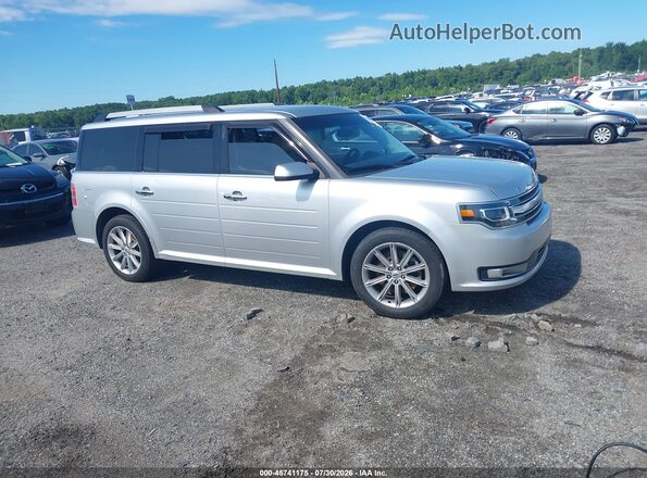 2FMHK6D80HBA11912 2017 FORD FLEX Silver Vista interior trasera