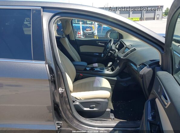 2FMPK3J88HBC16909 2017 FORD EDGE Серый Вид салона спереди