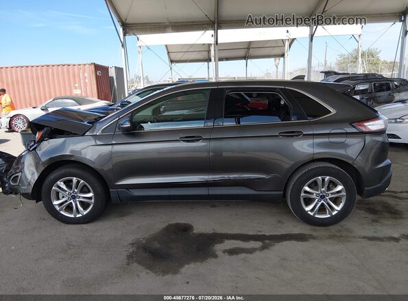 2FMPK3J8XJBB39997 2018 FORD EDGE Gray Rear interior view